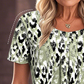 🌿✨ Női Laza Mintás Kerek Nyakú Rövid Ujjú Felső – 3 szín | S–3XL | Túlméretezett | Casual Chic