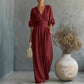 Női V-nyakú, magas derekú, széles szárú jumpsuit